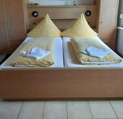 Ein Bett oder Betten in einem Zimmer der Unterkunft Mosel Panorama