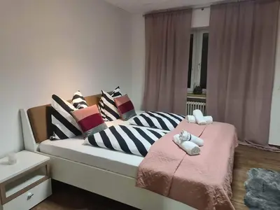 Ein Bett oder Betten in einem Zimmer der Unterkunft Wohnung 51