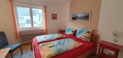 Ein Bett oder Betten in einem Zimmer der Unterkunft Pension Regina