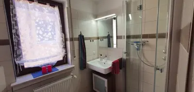 Ein Badezimmer in der Unterkunft Pension Regina