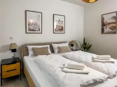 Ein Bett oder Betten in einem Zimmer der Unterkunft Moselblick I ad Reichsburg Parkplatz 100m Marktplatz