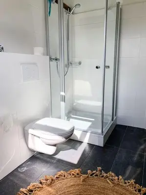 Ein Badezimmer in der Unterkunft Ferienwohnungen Alte Destillerie