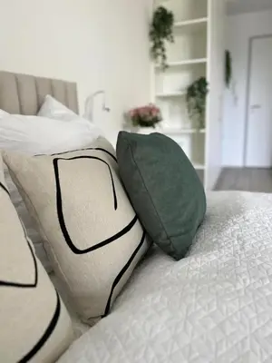 Ein Bett oder Betten in einem Zimmer der Unterkunft Wanderlust Petrisberg - Studio 54