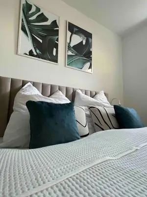 Ein Bett oder Betten in einem Zimmer der Unterkunft Wanderlust Petrisberg - Studio 53