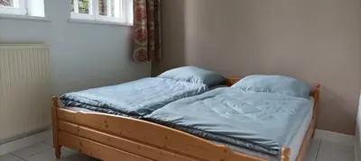 Ein Bett oder Betten in einem Zimmer der Unterkunft Eifelerlebnis