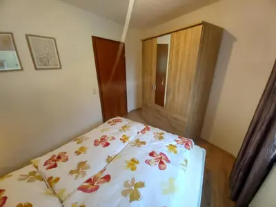 Ein Bett oder Betten in einem Zimmer der Unterkunft Ferienwohnung Sophia