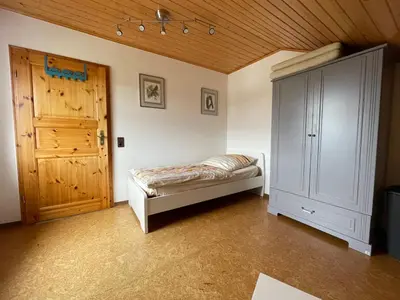 Ein Bett oder Betten in einem Zimmer der Unterkunft Ferienwohnung zum Nürburgring
