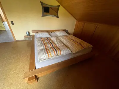 Ein Bett oder Betten in einem Zimmer der Unterkunft Ferienwohnung zum Nürburgring