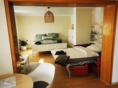 Ein Bett oder Betten in einem Zimmer der Unterkunft Ferienwohnung Landblick