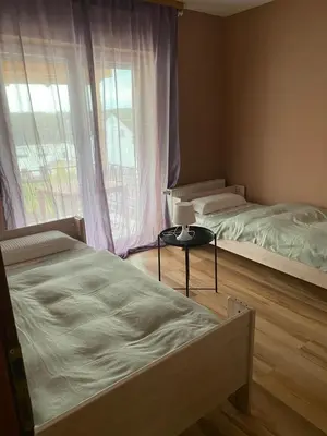 Ein Bett oder Betten in einem Zimmer der Unterkunft Sinan's Bio Tourismus Farm Appartement
