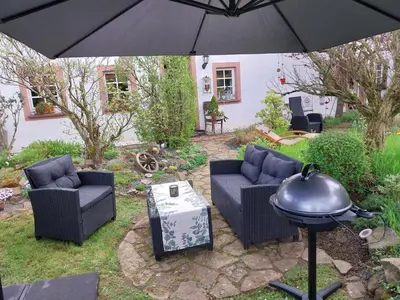 Ein Sitzbereich in der Unterkunft Ferienwohnung Zum Jehöschnis