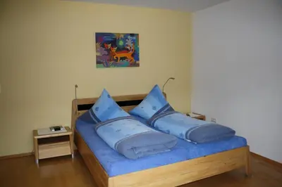 Ein Bett oder Betten in einem Zimmer der Unterkunft Weingut Goeres