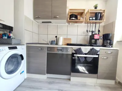 Küche/Küchenzeile in der Unterkunft FeWo Innenstadt mit Dachterasse, Grill, bis 8 Personen, 3 SZ