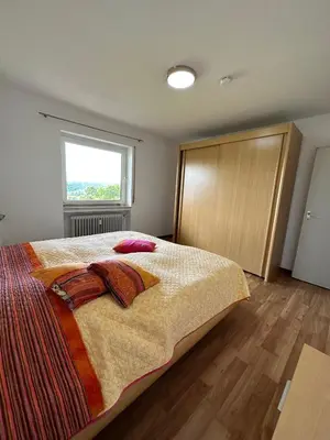 Ein Bett oder Betten in einem Zimmer der Unterkunft Ferienwohnung auf Pferdehof