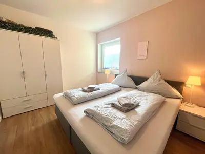 Ein Bett oder Betten in einem Zimmer der Unterkunft Ferienwohnung Sonnenterrasse, 1-4 Personen, 2 Schlafzimmer, große Terrasse