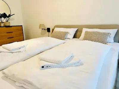 Ein Bett oder Betten in einem Zimmer der Unterkunft BIG bis zu 10 Gästen Moselblick ad Reichsburg 100m Marktplatz