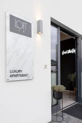 Ein Zertifikat, Auszeichnung, Logo oder anderes Dokument, das in der Unterkunft LOFT19 Neu Design Luxus Maisonette Balkon für 2 Personen ausgestellt ist