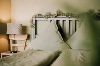 Ein Bett oder Betten in einem Zimmer der Unterkunft SOONWALD Studio mit Terrasse & Whirlpool