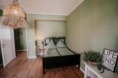 Ein Bett oder Betten in einem Zimmer der Unterkunft SOONWALD Studio mit Terrasse & Whirlpool