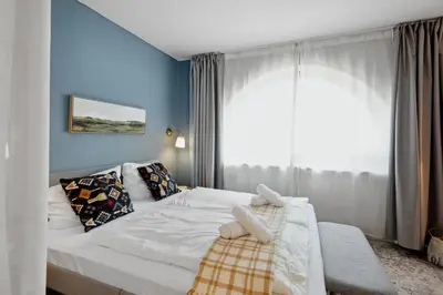 Ein Bett oder Betten in einem Zimmer der Unterkunft Gemütliches & Modernes Apartment