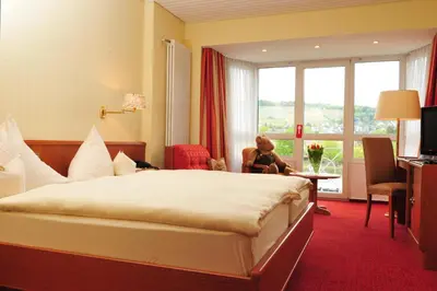 Ein Bett oder Betten in einem Zimmer der Unterkunft Hotel Bären