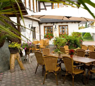 Ein Restaurant oder anderes Speiselokal in der Unterkunft Landgasthof Rebstock