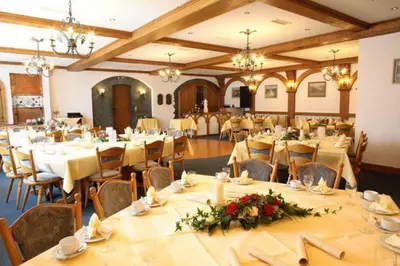 Ein Restaurant oder anderes Speiselokal in der Unterkunft Landgasthof Rebstock