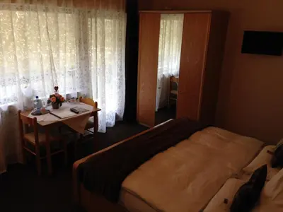 Ein Bett oder Betten in einem Zimmer der Unterkunft Mosel-Pension Gästehaus Christiane, Brodenbach