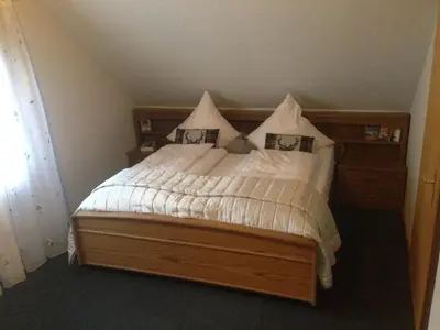 Ein Bett oder Betten in einem Zimmer der Unterkunft Mosel-Pension Gästehaus Christiane, Brodenbach