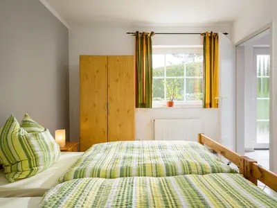 Ein Bett oder Betten in einem Zimmer der Unterkunft Apartment Kiefernweg by Interhome
