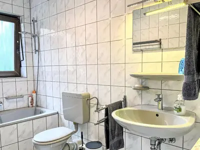 Ein Badezimmer in der Unterkunft Apartment Ferienapartments Adenau-1 by Interhome