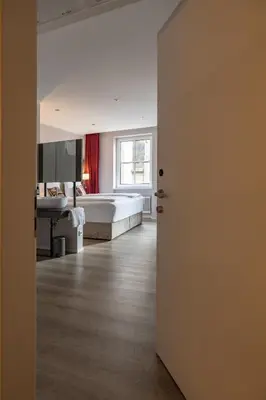 Ein Bett oder Betten in einem Zimmer der Unterkunft MEA HOTEL TRIER