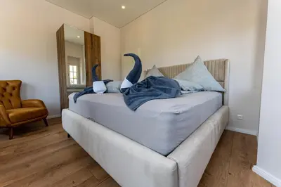 Ein Bett oder Betten in einem Zimmer der Unterkunft Moselresidenz Bellevue Alf