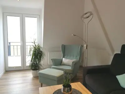 Ein Sitzbereich in der Unterkunft Ferienwohnung am Weingarten