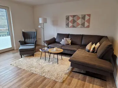 Ein Sitzbereich in der Unterkunft Ferienwohnung am Weingarten