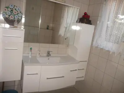 Ein Badezimmer in der Unterkunft Haus Idylle Weindorf Duchroth - Helle Souterrain Ferienwohnung