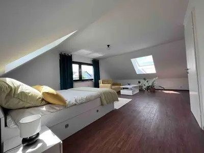 Ein Bett oder Betten in einem Zimmer der Unterkunft Gasthaus Maarfeld Gerolstein
