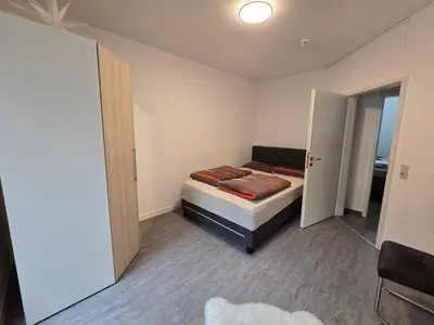 Ein Bett oder Betten in einem Zimmer der Unterkunft Ferienwohnung zentrale Lage