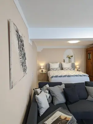 Ein Bett oder Betten in einem Zimmer der Unterkunft Tor zur Teufelsschlucht