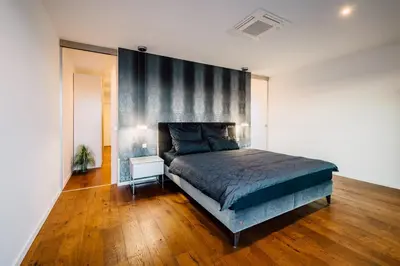 Ein Bett oder Betten in einem Zimmer der Unterkunft Traumblick trifft Luxus!