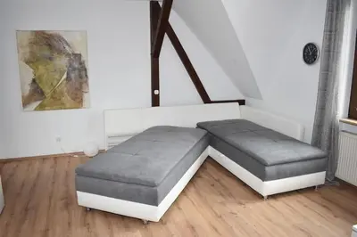 Ein Bett oder Betten in einem Zimmer der Unterkunft Kleine Auszeit im alten Weingut