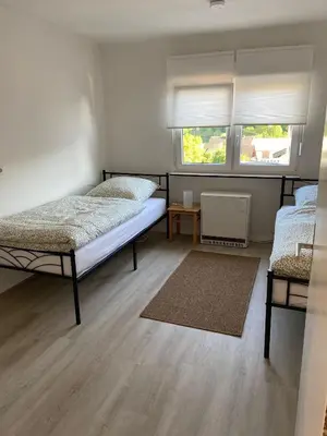 Ein Bett oder Betten in einem Zimmer der Unterkunft Ferienhaus MaLu