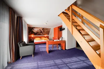 Ein Bett oder Betten in einem Zimmer der Unterkunft Gästehaus Fuchshof