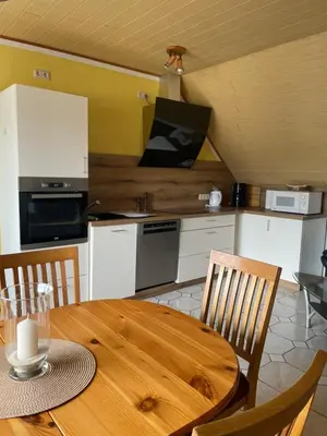 Küche/Küchenzeile in der Unterkunft Ferienwohnung Weingut Sanders & Sanders