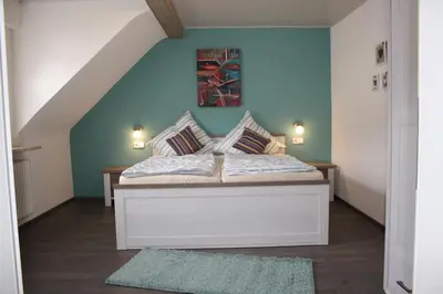 Ein Bett oder Betten in einem Zimmer der Unterkunft Ferienwohnung zur Trübenbach