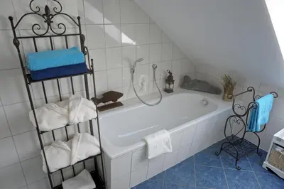 Ein Badezimmer in der Unterkunft Ferienwohnung Landfein Schalkenmehren