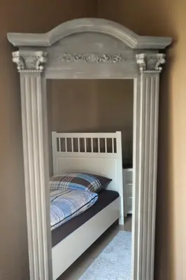 Ein Bett oder Betten in einem Zimmer der Unterkunft Ferienwohnung Landfein Schalkenmehren
