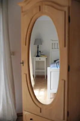 Ein Bett oder Betten in einem Zimmer der Unterkunft Ferienwohnung Landfein Schalkenmehren