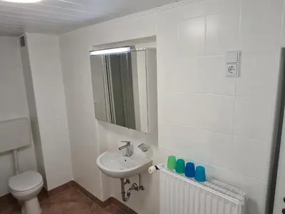 Ein Badezimmer in der Unterkunft Ferienhaus Mühlental 52