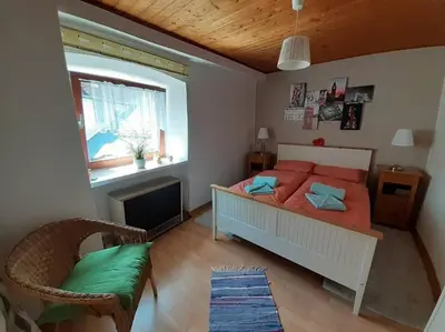 Ein Bett oder Betten in einem Zimmer der Unterkunft Fachwerk-Romantik 2 an der Mosel